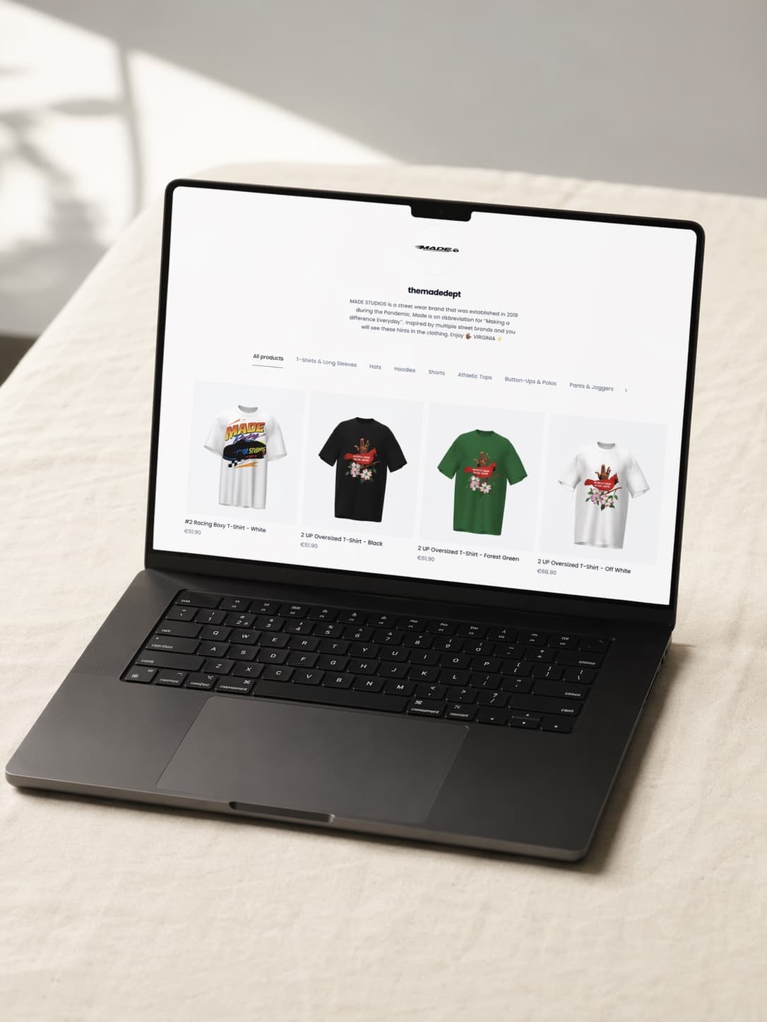 FLYP PRO creator storefront on MacBook
